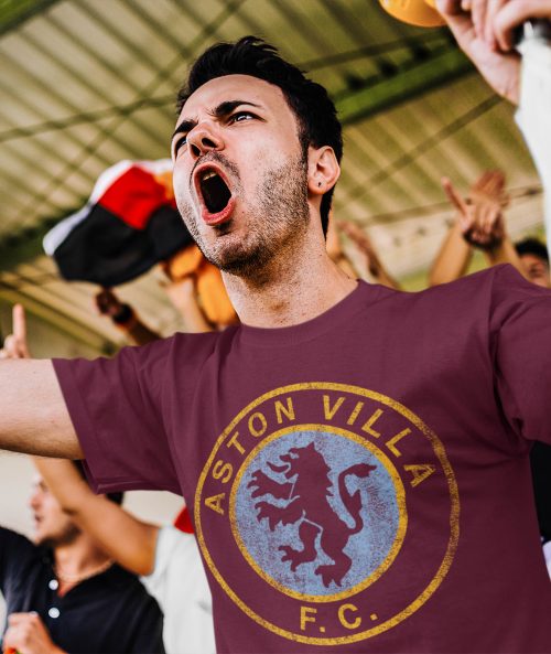 Foootbal fan in stands wearing retro Aston Villa t shirt