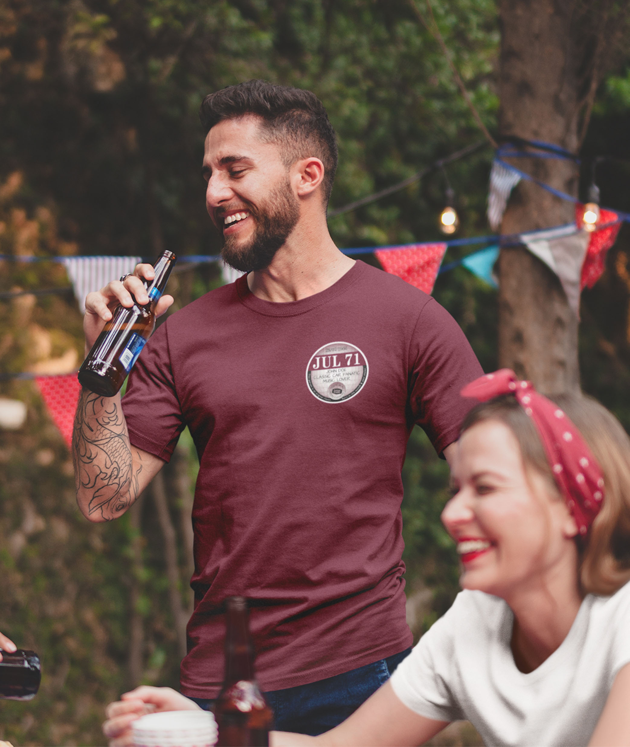 Man with beer wearing maroon July 71 left chest tax disc t shirt